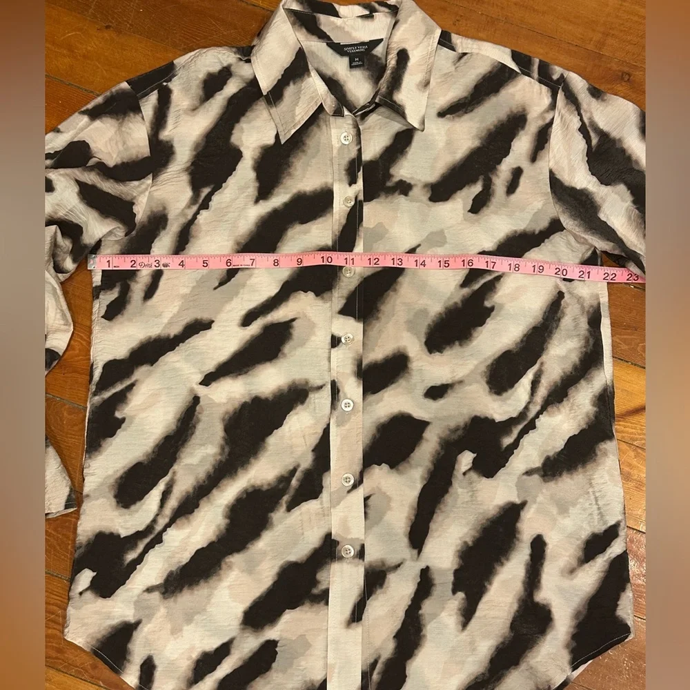 Black and cream zebra print button up blouse with tie at wrist and ruffle cuff - Picture 5 of 7